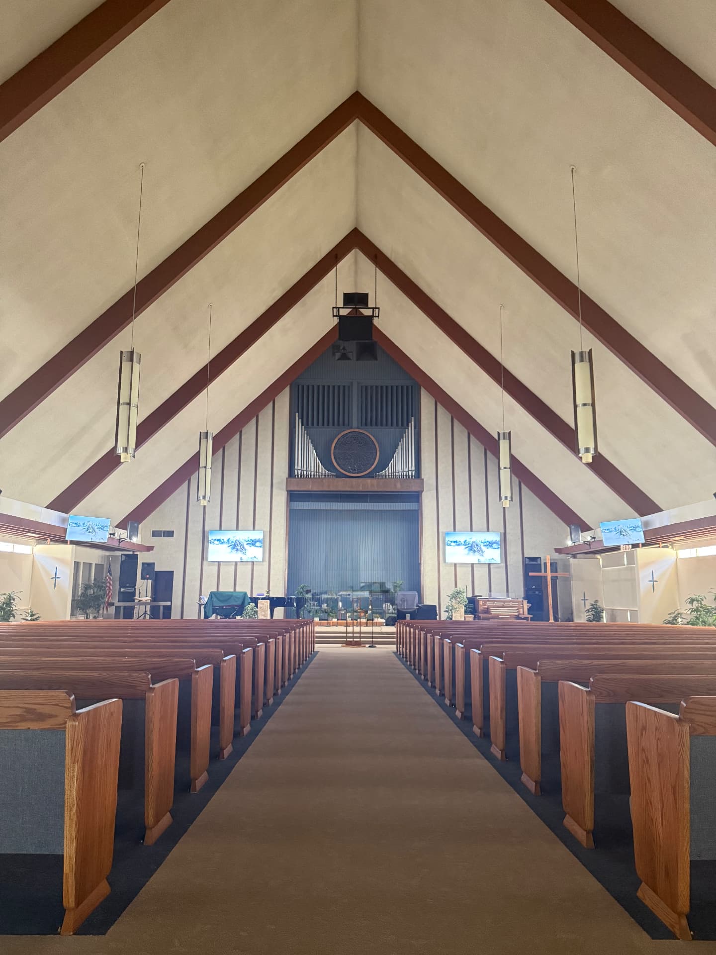 The sanctuary of Alhambra SDA Church, seen from the center aisle toward the pulpit and organ