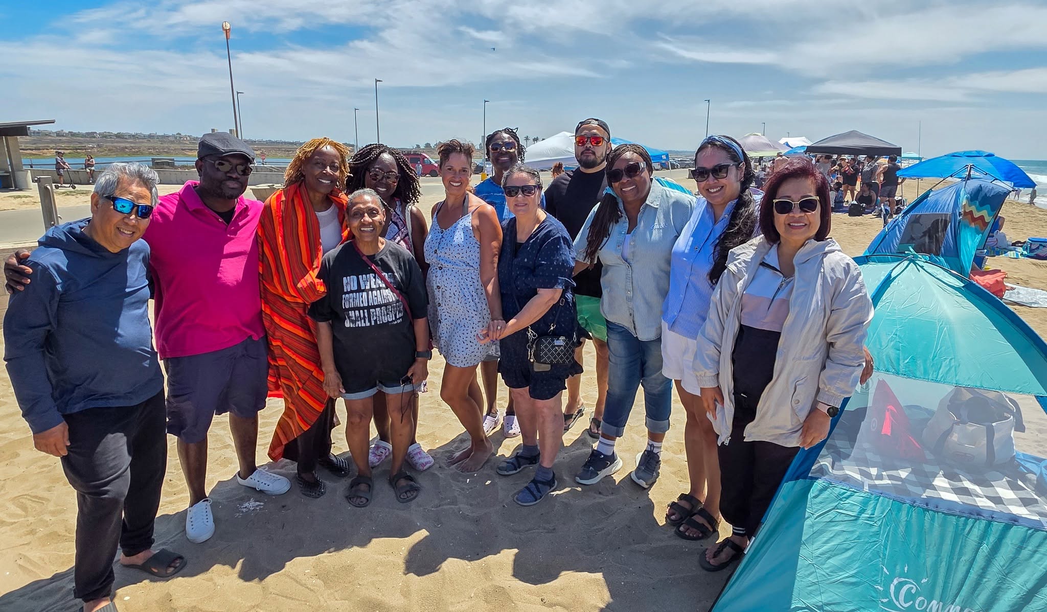 The Grace Place church community gathered together at the beach