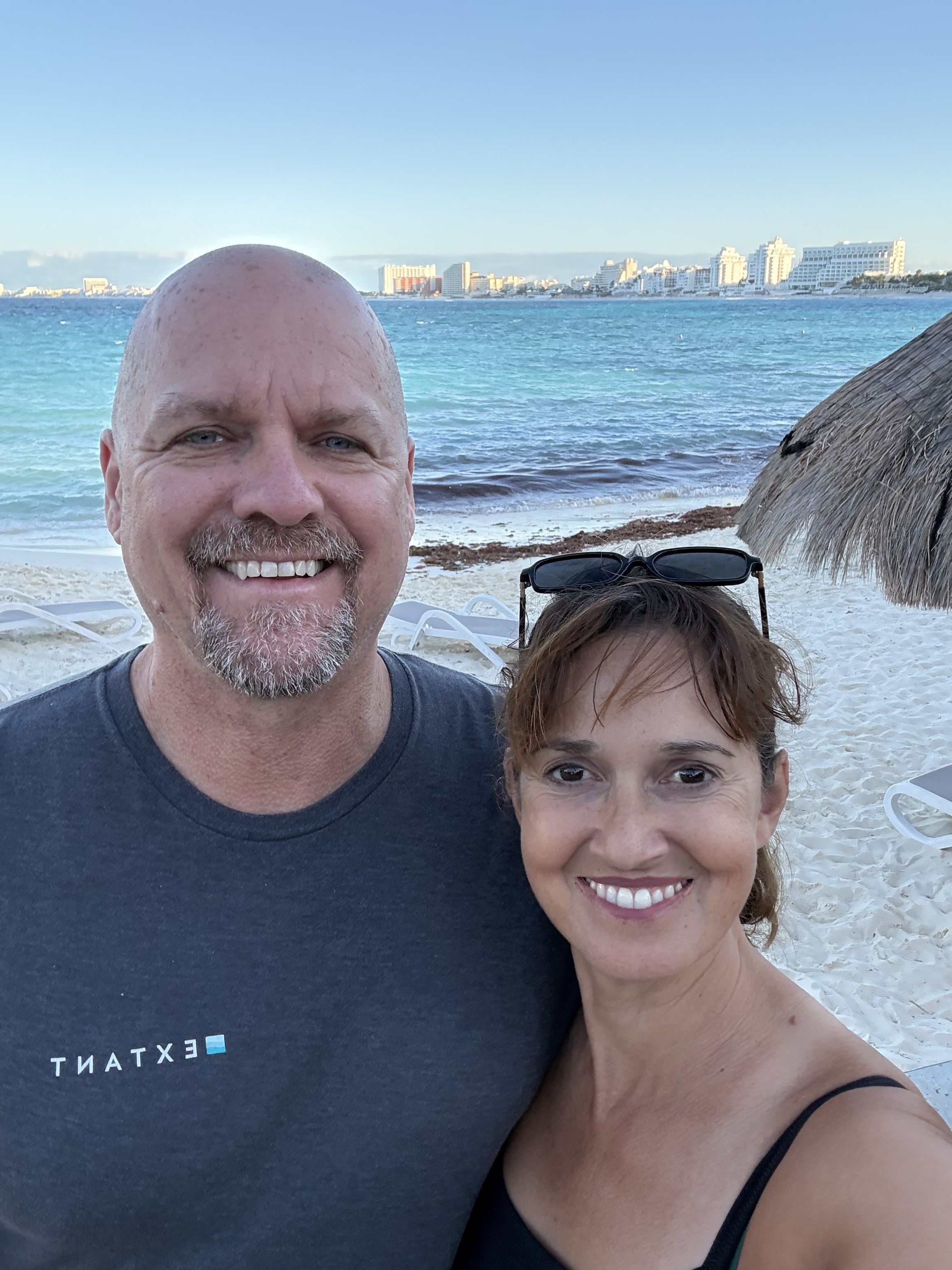 Pastor Celeste Harrison and her husband together at the beach